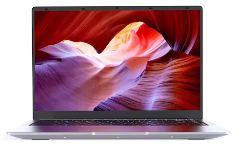 Open laptop displaying a bright screen.